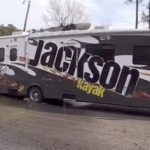 Dog Backs Motorhome Down Boat Ramp